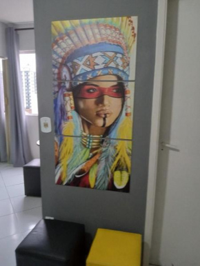 Apto em prédio frente a praia, 1 quarto, com garagem coberta, local privilegiado